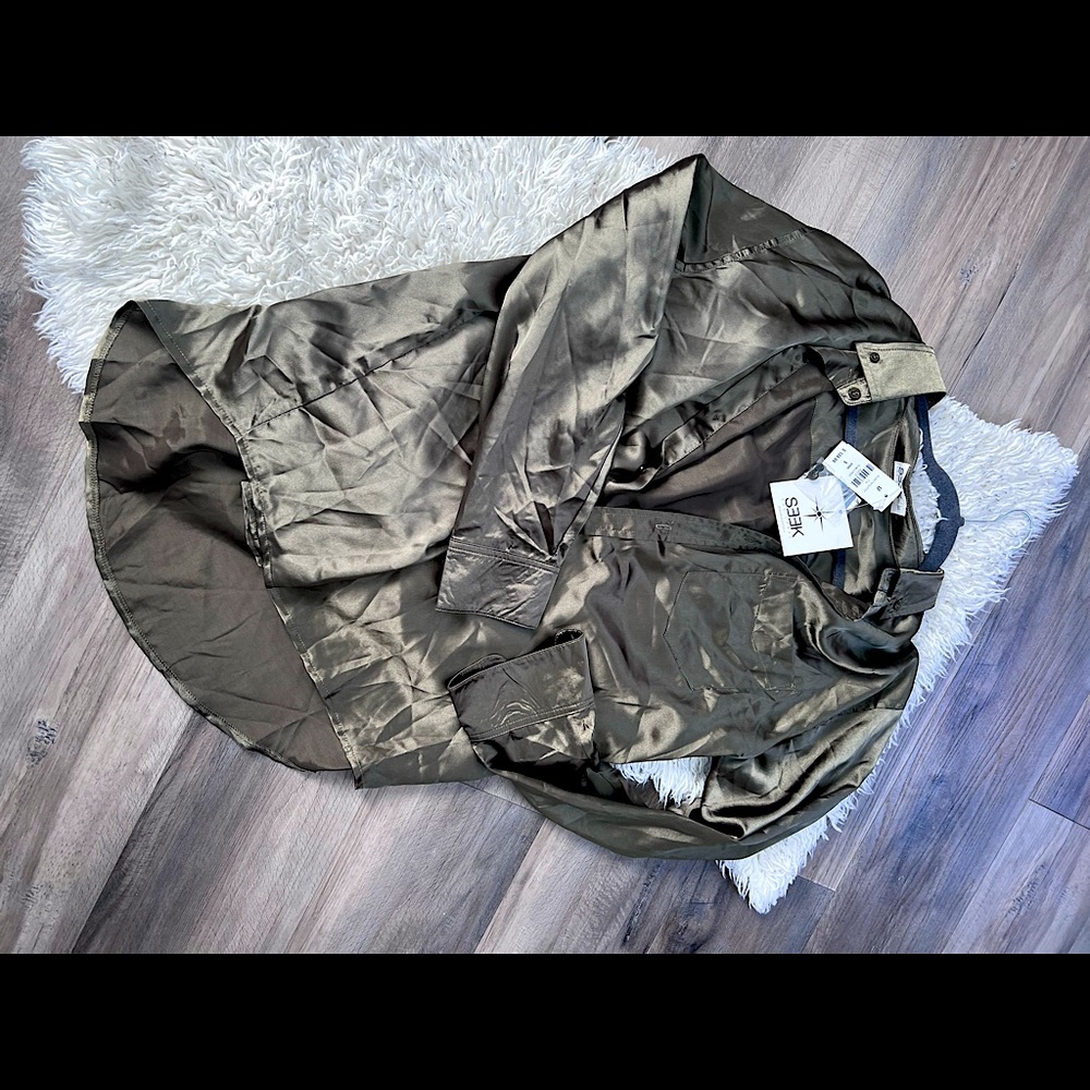 Seek the label olive chrome colored top from the LF store, small